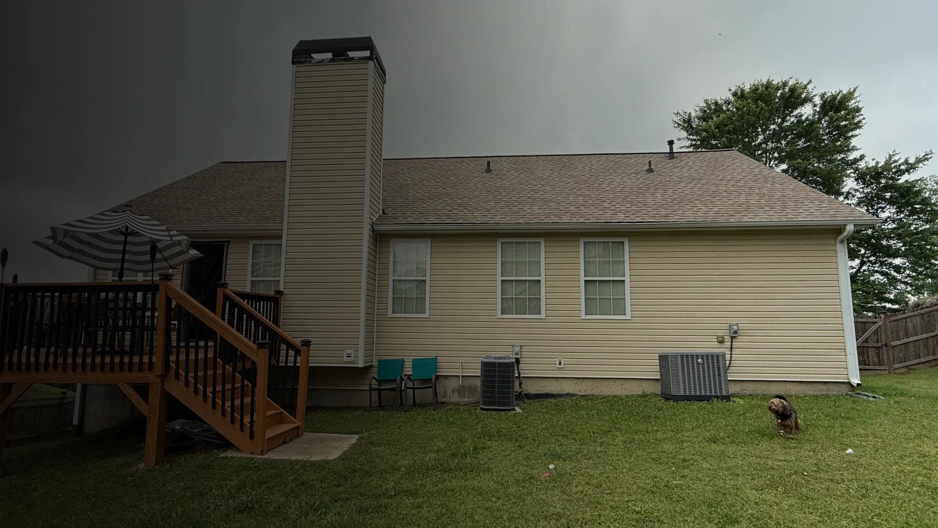 Residential exterior with an asphalt shingle roof